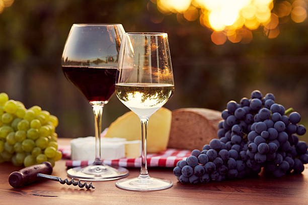two-glasses-of-white-and-red-wine.jpg