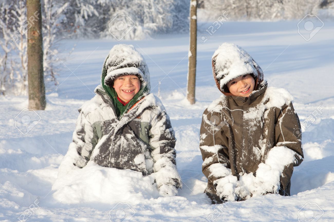 10666124-two-boys-playing-in-deep-snow.jpg