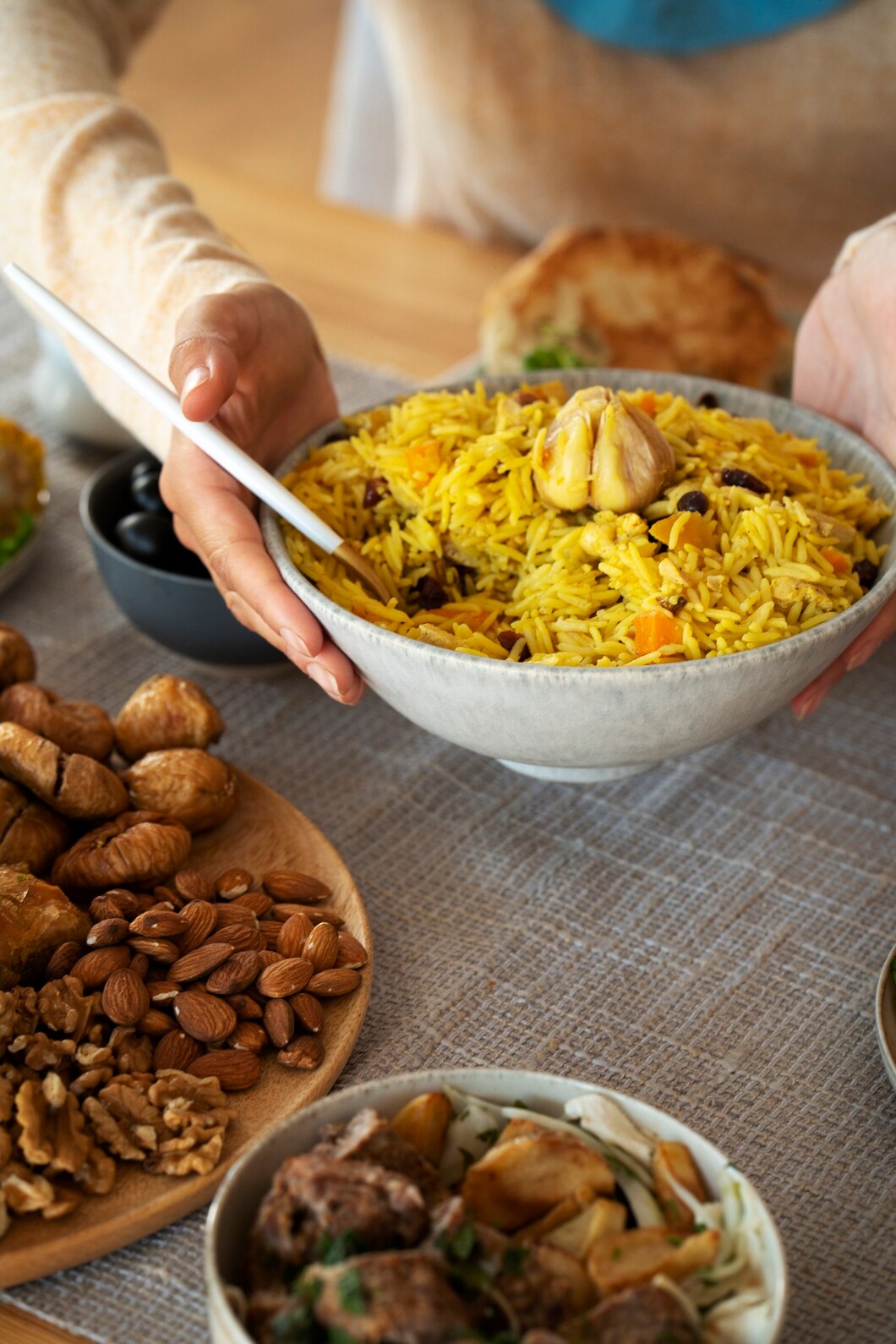 high-angle-hands-holding-delicious-food_23-2149636068.jpg
