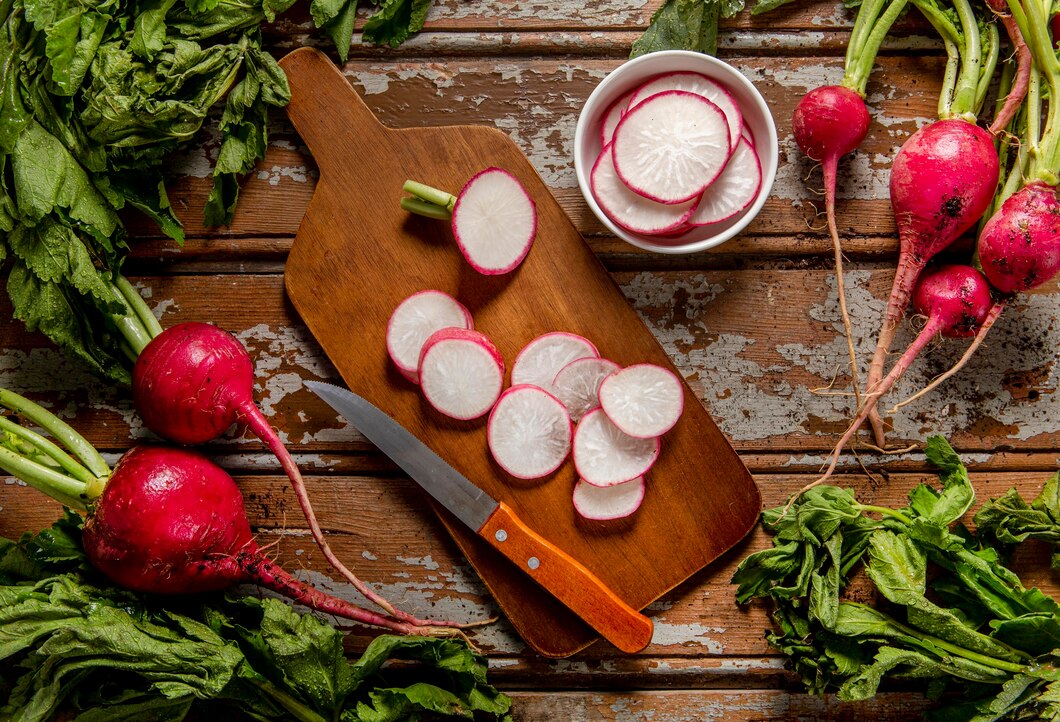 top-view-radishes-with-knife_23-2148622425.jpg