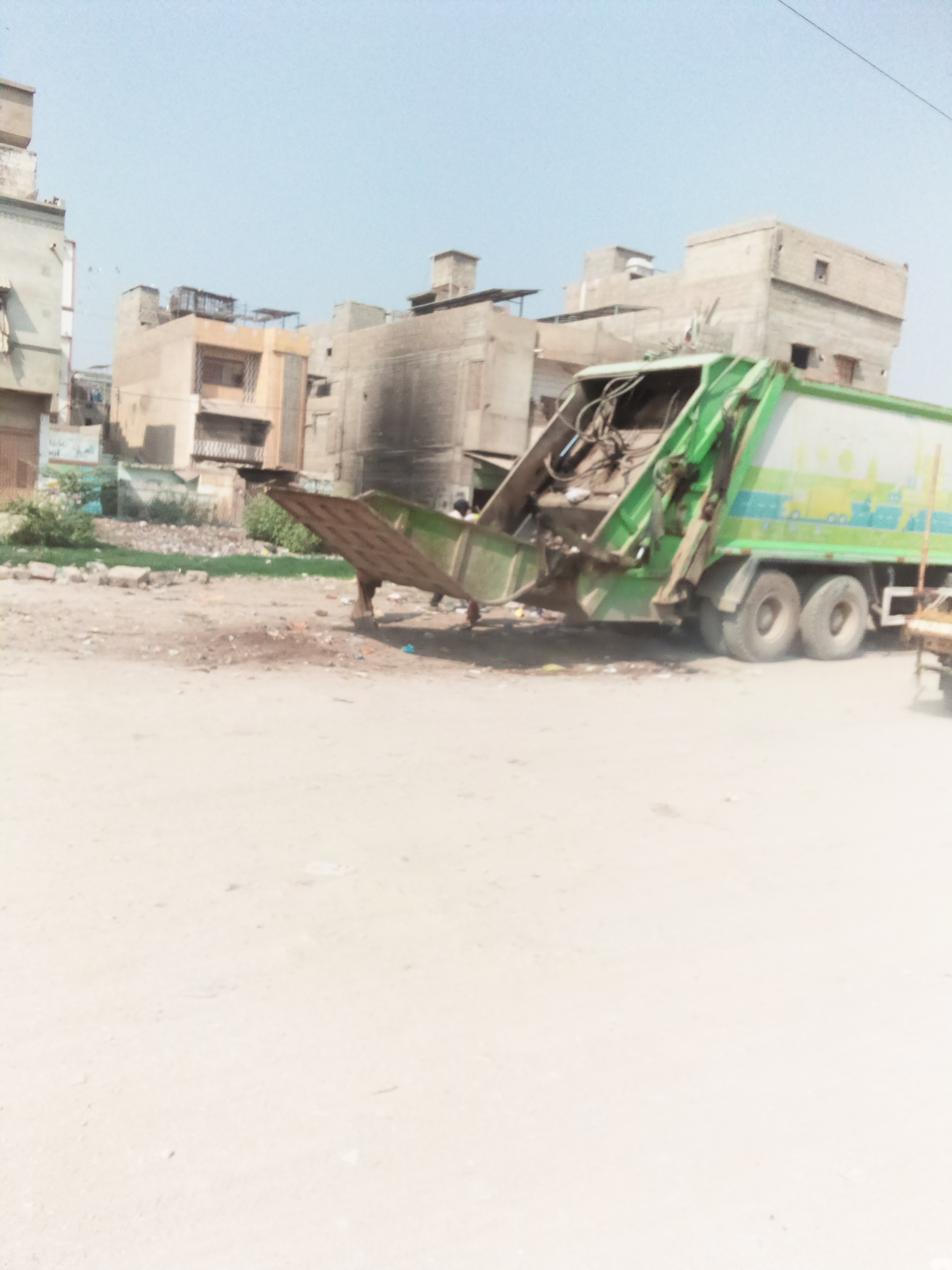 in Pakistan Trucks Carrying Garbage from Streets.jpg