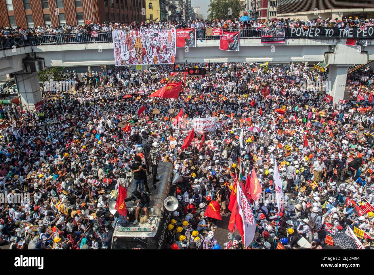 yangon-myanmar-22nd-feb-2021-protesters-gather-as-they-take-part-during-the-demonstration-a-massive-crowd-took-to-the-streets-of-yangon-to-protest-against-the-military-coup-and-demanded-the-release-of-aung-san-suu-kyi-myanm (1).jpg