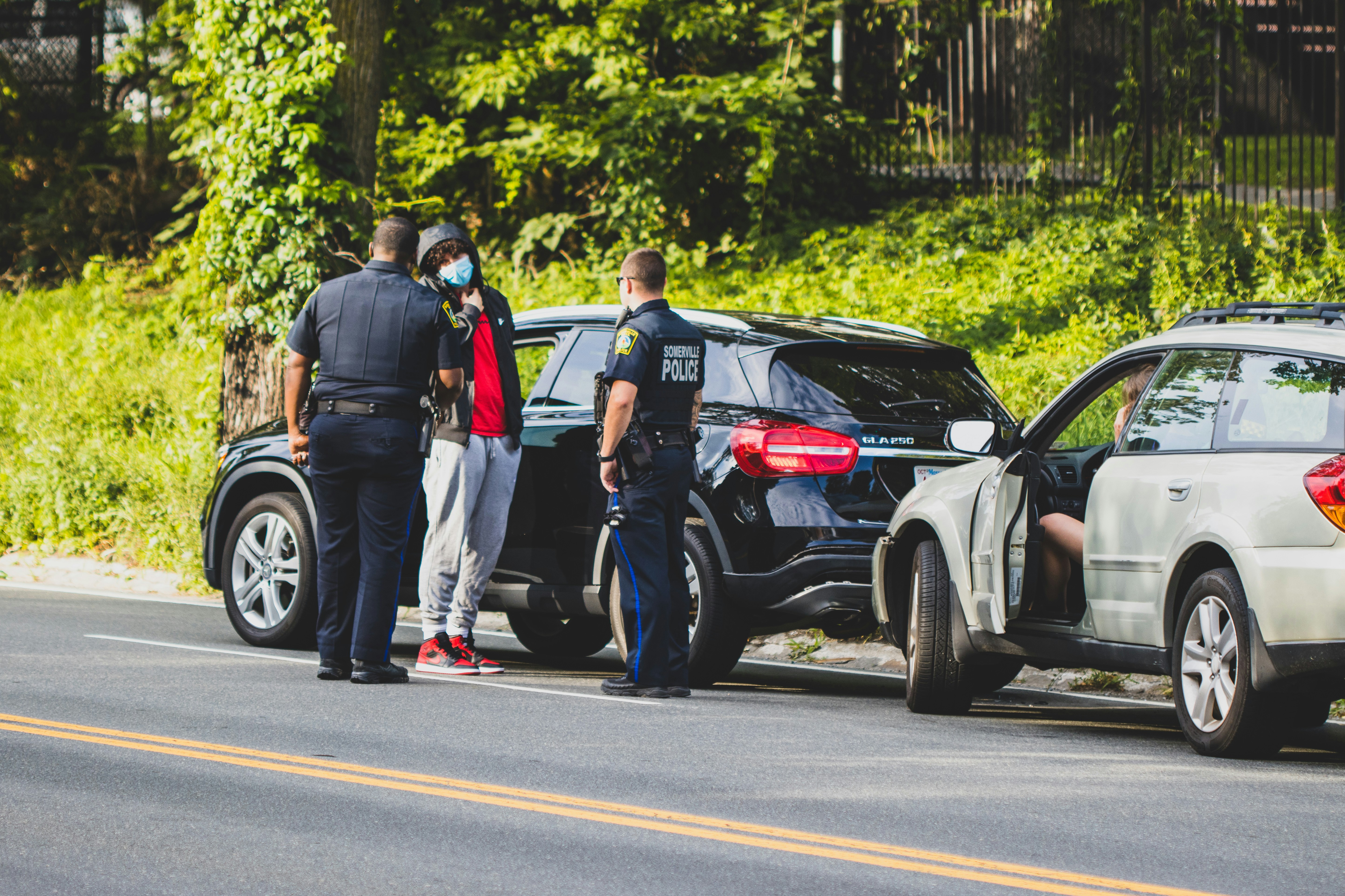 Police responding to multi-vehicle traffic accident on a city road