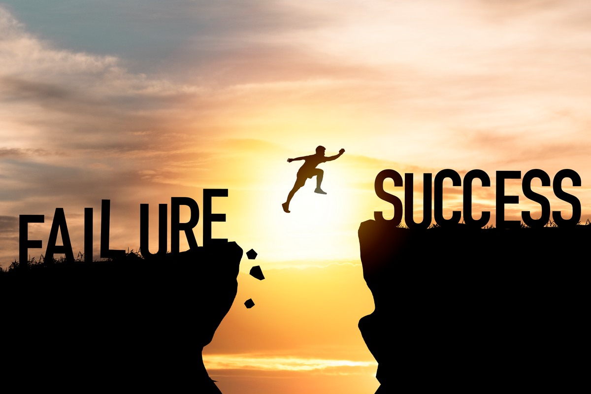 silhouette-man-jumping-from-failure-success.jpg