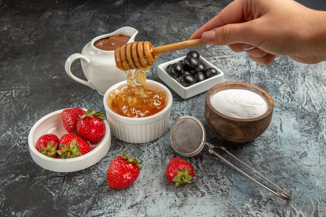 front-view-fresh-strawberries-with-honey-dark-surface-fruit-sweet-jelly-food_140725-81944.jpg
