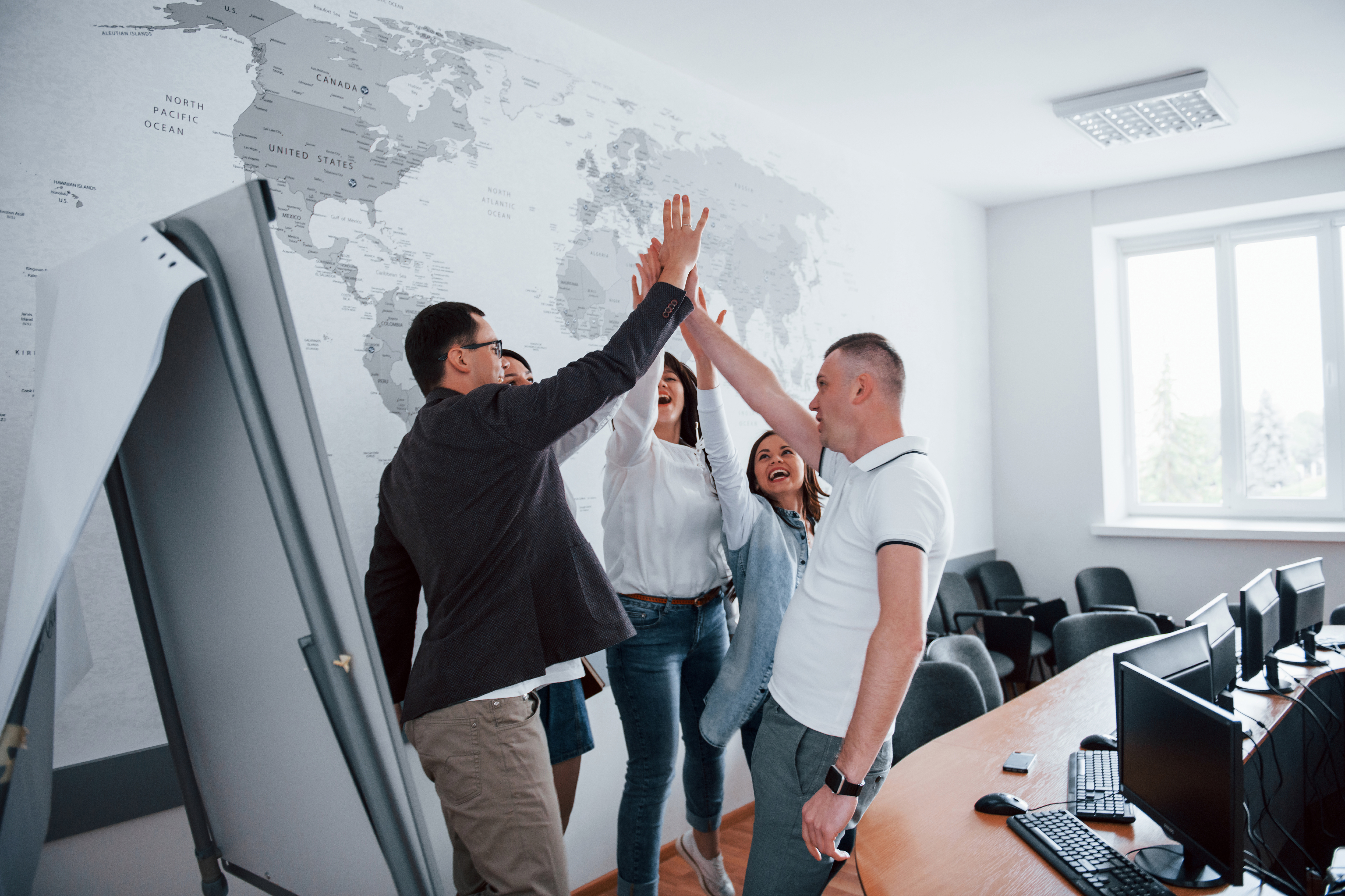 you-are-awesome-congratulations-business-people-and-manager-working-on-their-new-project-in-classroom.jpg