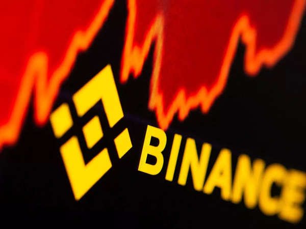 file-photo-binance-logo-and-stock-graph-are-displayed-in-this-illustration.jpg