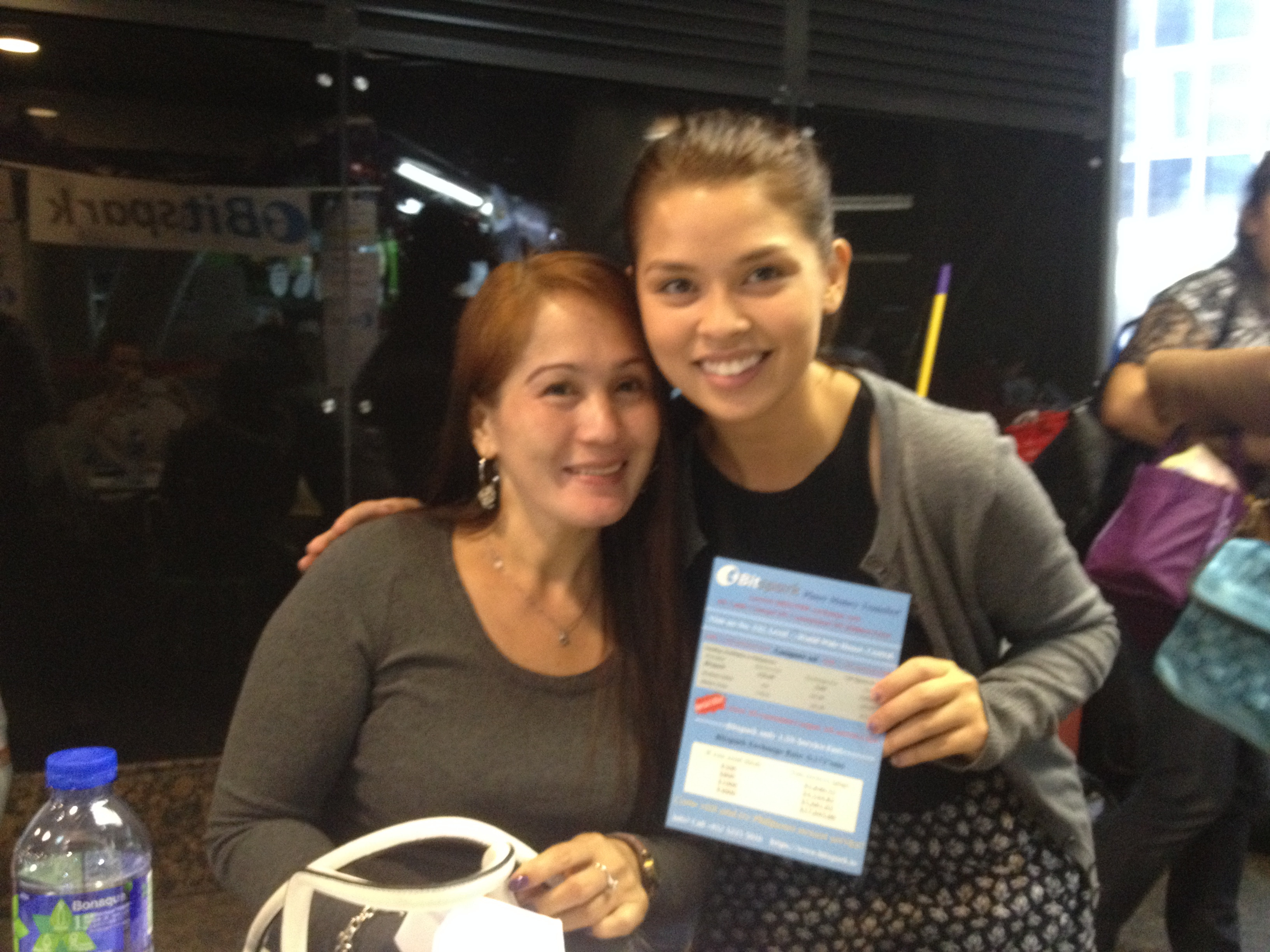 Maxien and First Customer .jpg