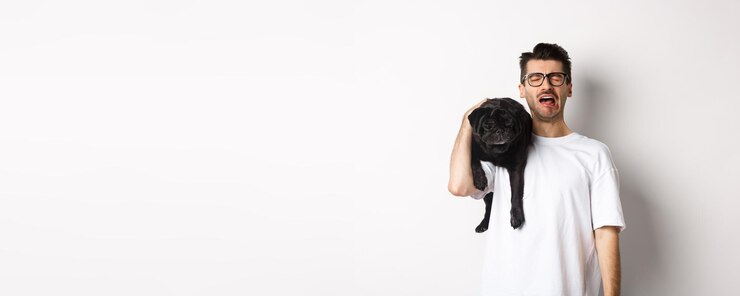sad-dog-owner-crying-holding-cute-black-pug-shoulder-looking-miserable-sobbing-while-standing_1258-155583.jpg