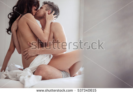 stock-photo-intimate-young-couple-hugging-and-kissing-man-and-woman-in-bed-having-passionate-sex-537340615.jpg