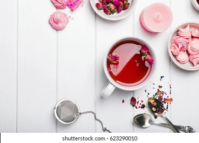 herbal-tea-roses-on-white-260nw-623290010.webp