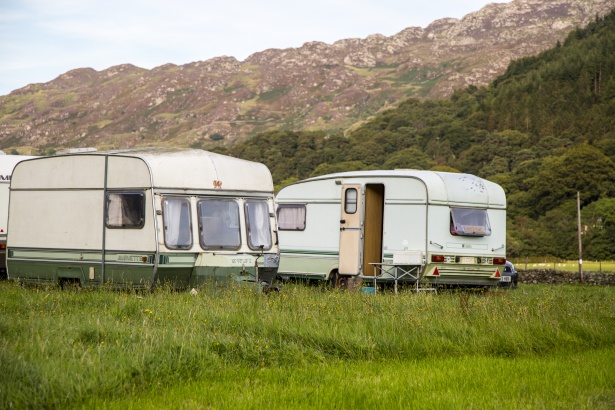 old-caravan-parked-in-a-campsite.jpg