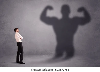 business-man-looking-his-own-260nw-523572754.webp