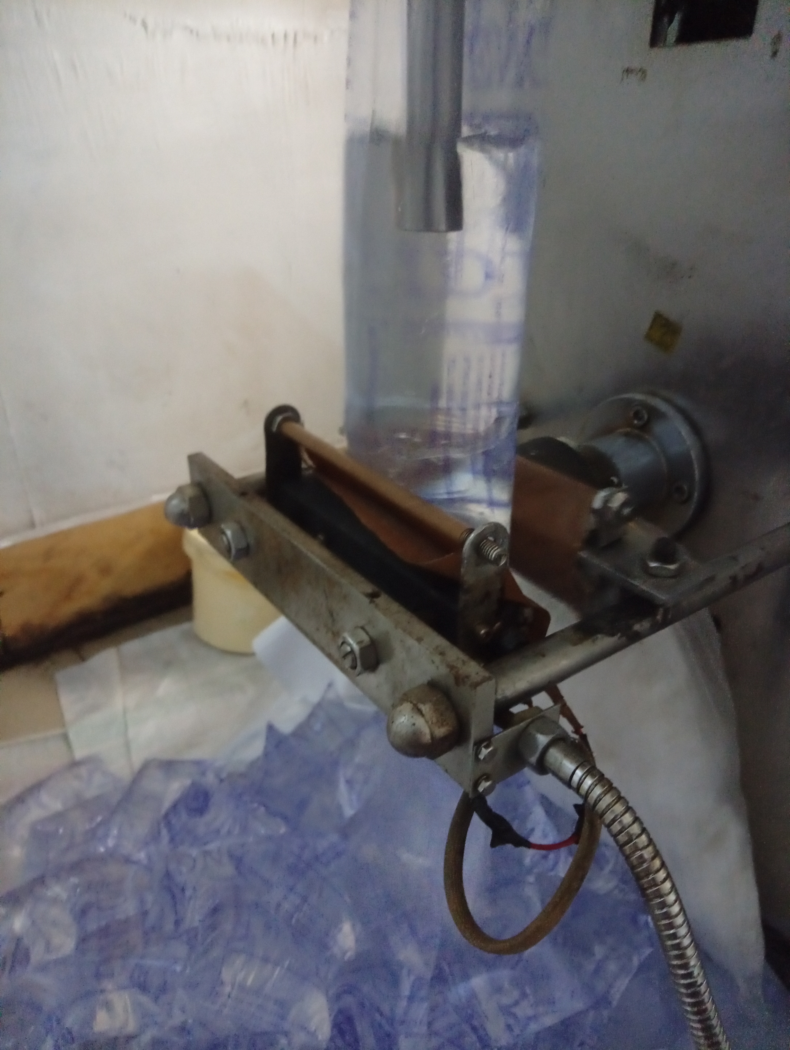 Keeping a close eye on the sealing process to ensure quality control.