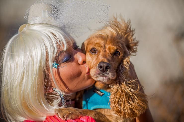 Girls-kisses-a-dog-at-Burning-Man-Festival.jpg