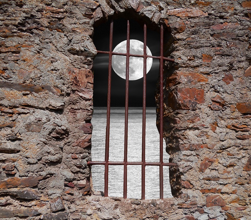 Moon behind bars pixa.jpg