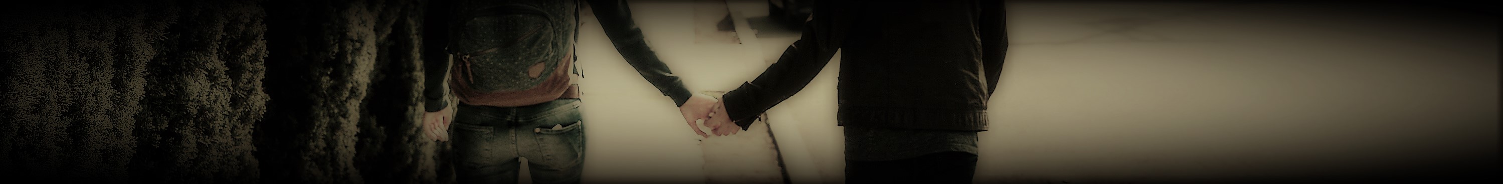 boy-girl-holding-hands-on-the-sidewalk (2).jpg