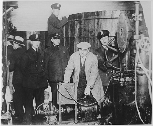 500px-Detroit_police_inspecting_equipment_found_in_a_clandestine_underground_brewery_during_the_prohibition_era_-_NARA_-_541928.jpg