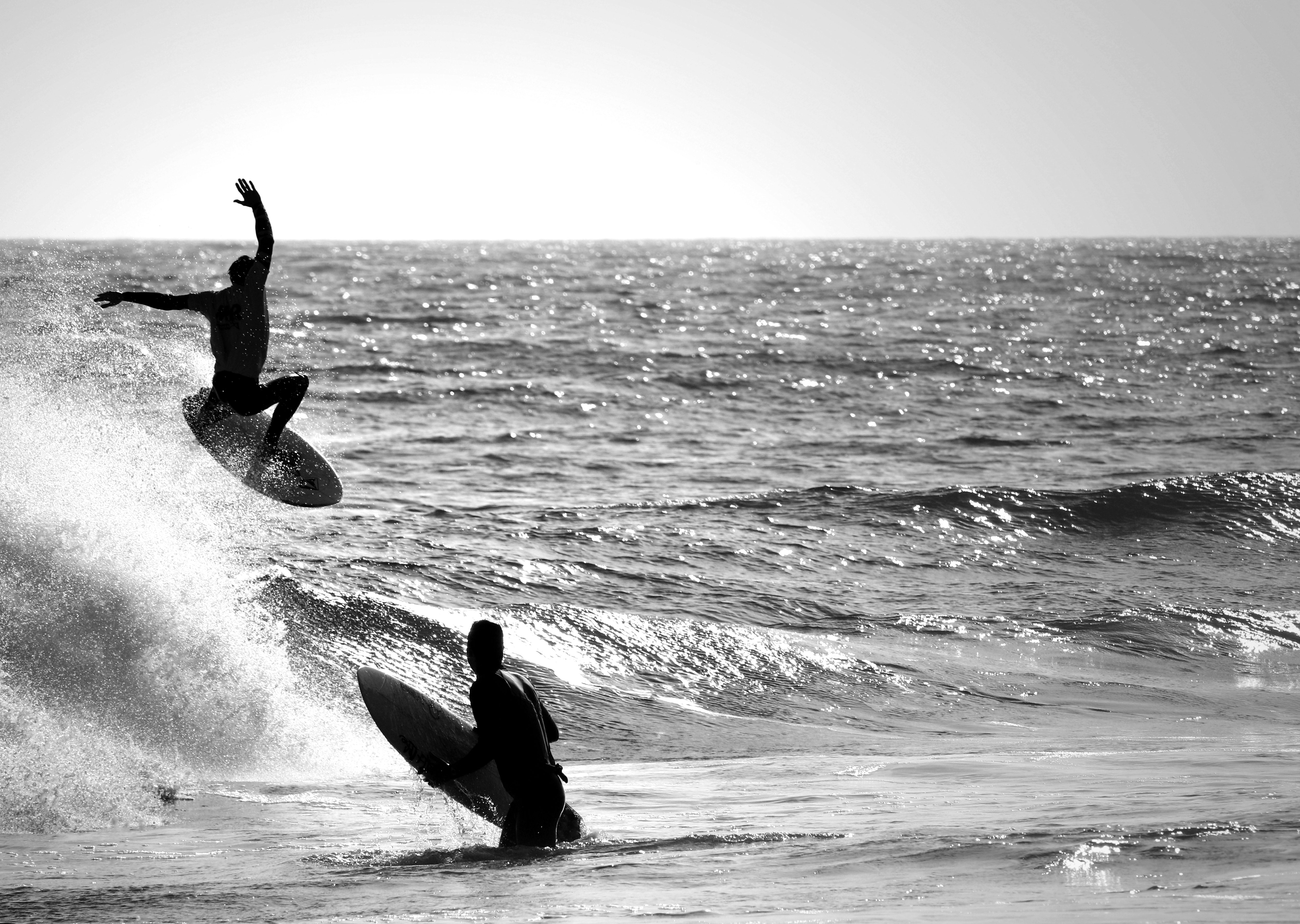 sihouette surfers.JPG