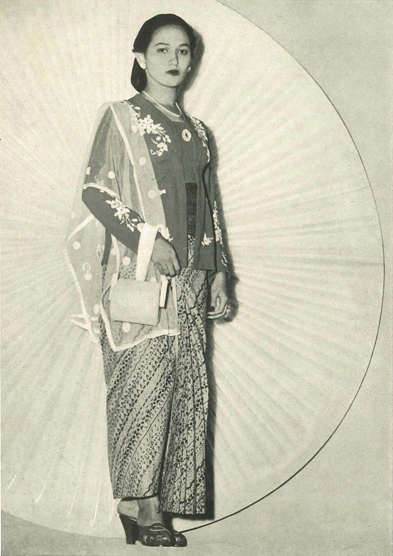 Modern_(1950s)_woman,_Wanita_di_Indonesia_p20_(Ministry_of_Information).jpg