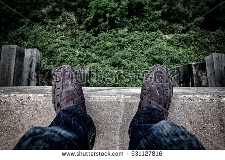 stock-photo-suicide-concept-depressed-young-man-looking-down-at-his-shoe-and-contemplating-suicide-on-the-531127816.jpg