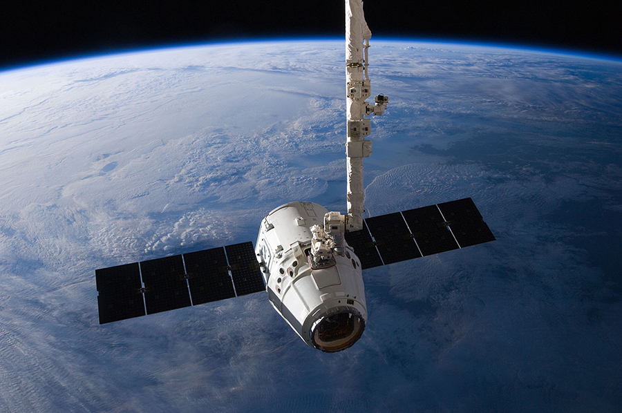 SpaceX_Dragon_C2+_just_prior_to_Canadarm2_release_(ISS031-E-079326).jpg