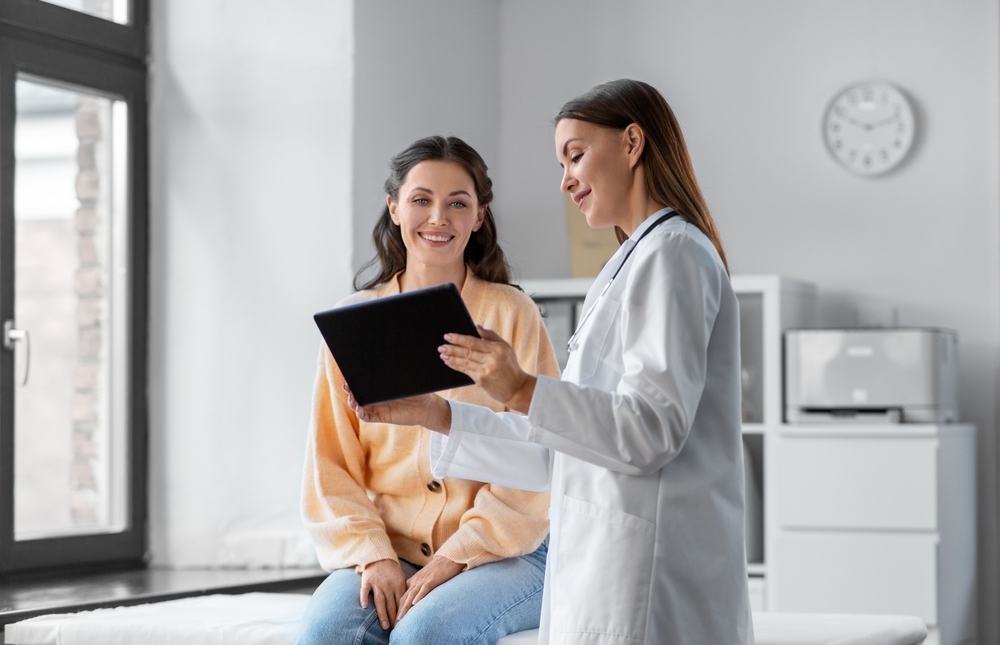 medical-banner-with-doctor-holding-tablet.jpg