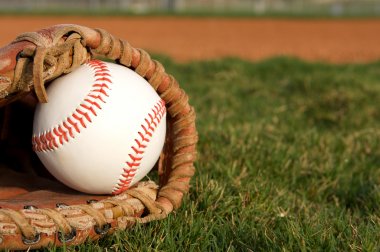 depositphotos_12389729-stock-photo-baseball-in-a-glove.jpg