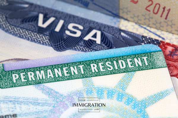 Deportation document with judge gavel and law book for immigration court case