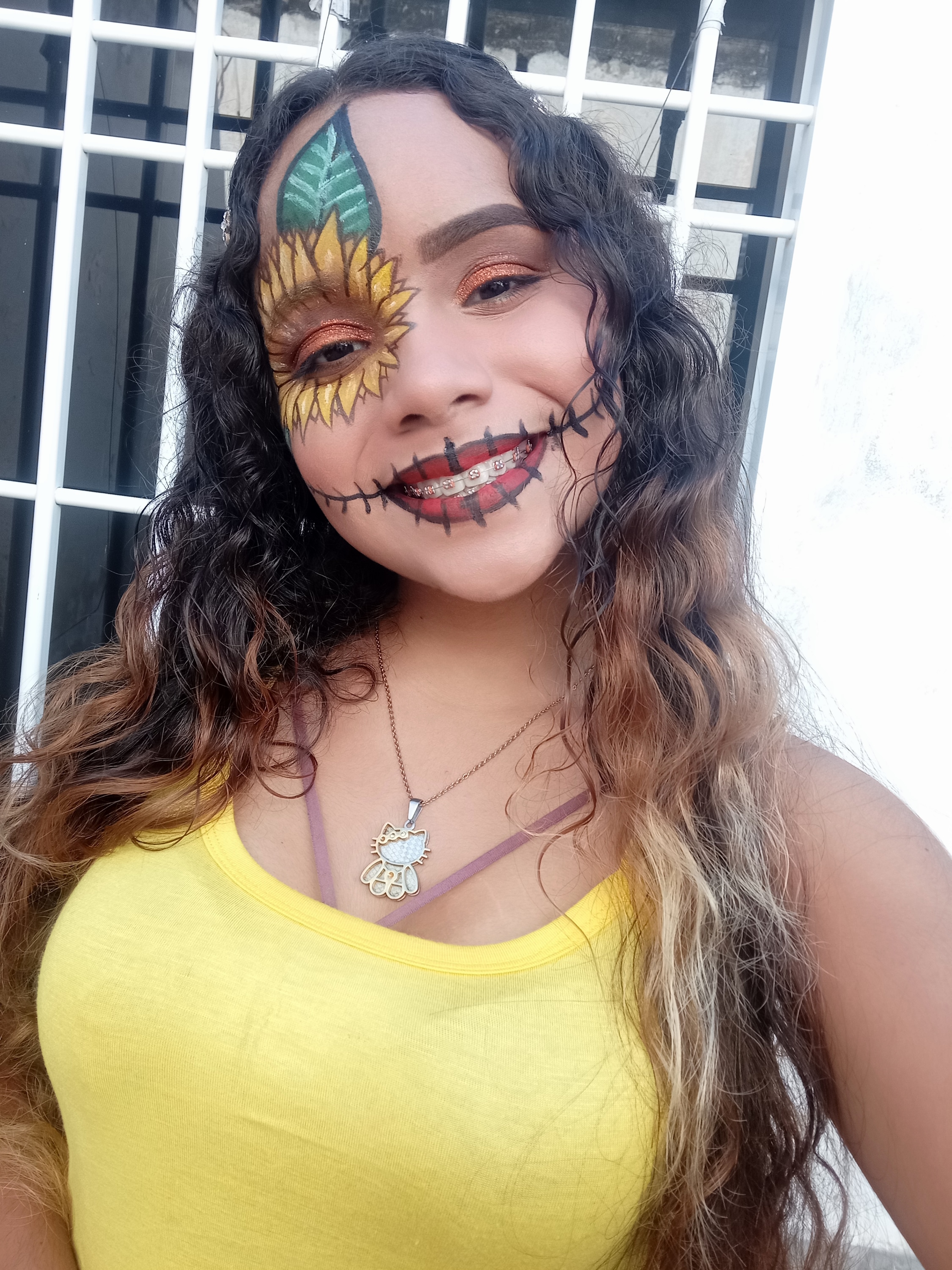 Maquillaje girasol catrina.jpeg