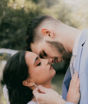 free-photo-of-side-view-of-the-bride-and-groom-almost-kissing.jpeg