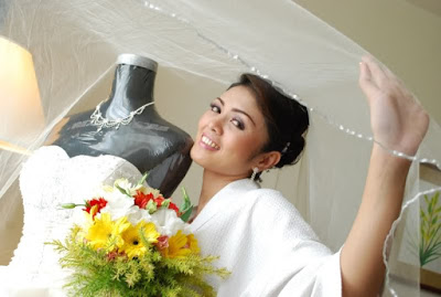Bride with her dress.JPG