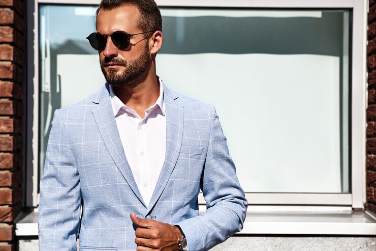 portrait-sexy-handsome-fashion-businessman-model-dressed-elegant-blue-suit-posing-street-background-metrosexual_158538-10436.jpg